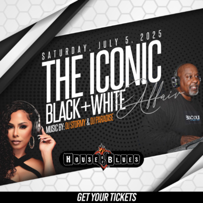 Elegant crowd dressed in black and white at a packed upscale venue with DJs performing and vibrant party lights, celebrating Black excellence